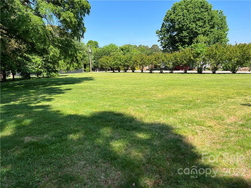 506 8th Street Southwest Conover, NC 28613 - Photo 37 of 38 a view of a grassy field with trees