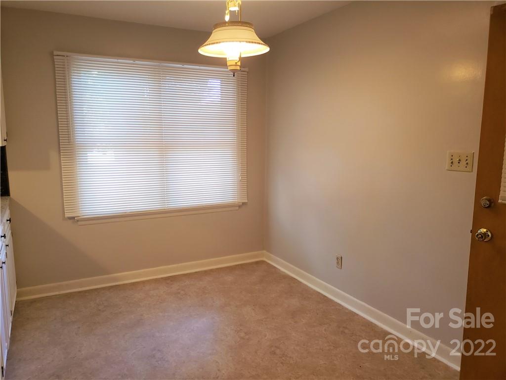 506 8th Street Southwest Conover, NC 28613 - Photo 6 of 38 an empty room with a window
