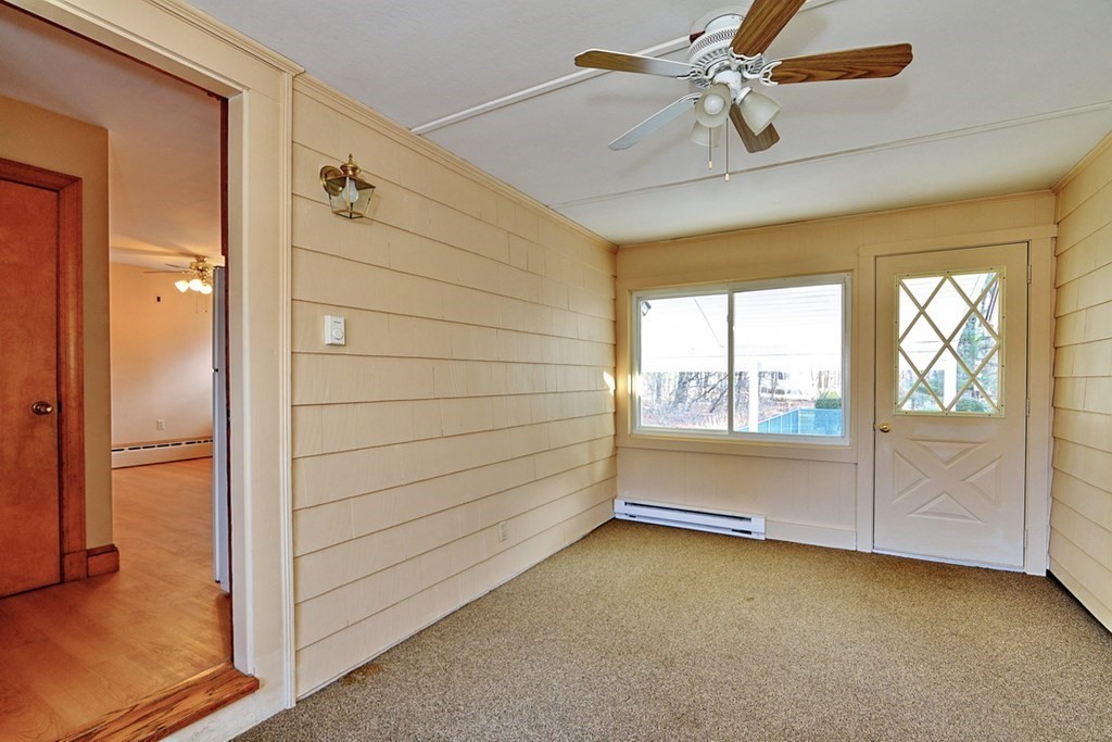 44 Everett Street Franklin, MA 02038 - Photo 6 of 31 a view of an empty room with a window