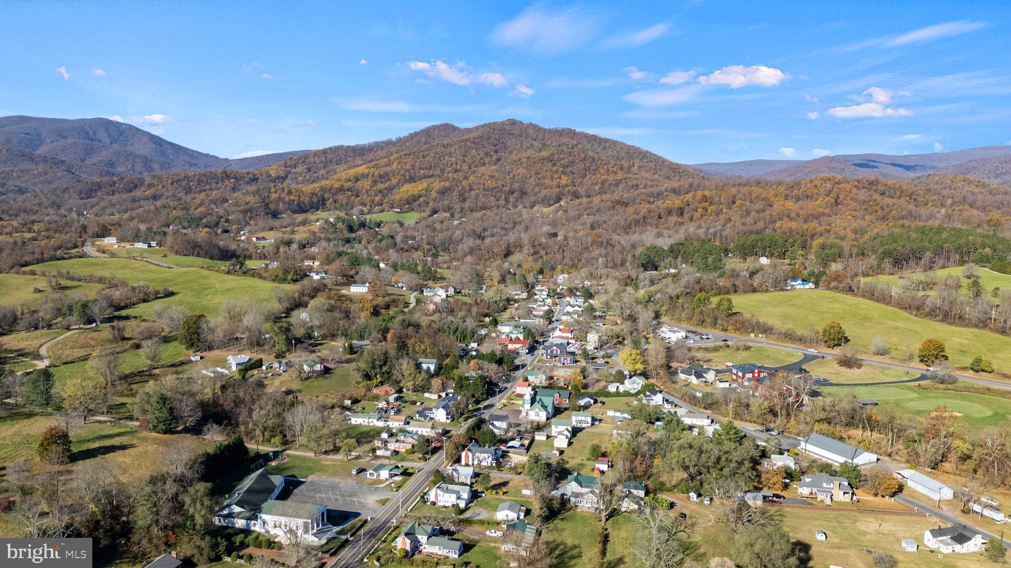 0 Woodward Road Sperryville, VA 22740 - Photo 14 of 22 a view of a city with mountains in the background