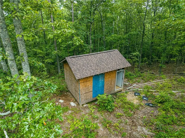 a house view with a backyard space