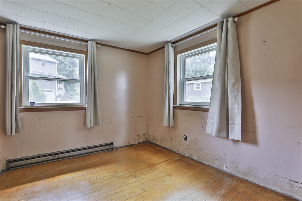 4 Cross Street Windham, NH 03087 - Photo 14 of 30 a view of an empty room with a window