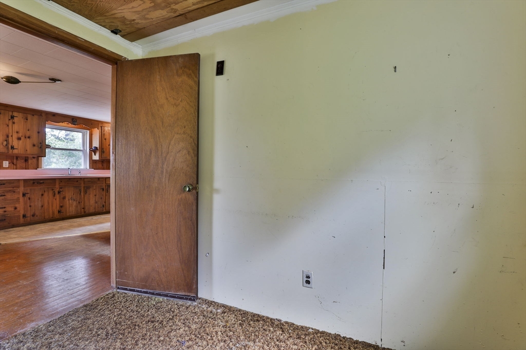 4 Cross Street Windham, NH 03087 - Photo 17 of 30 a view of a hallway with wooden floor and closet