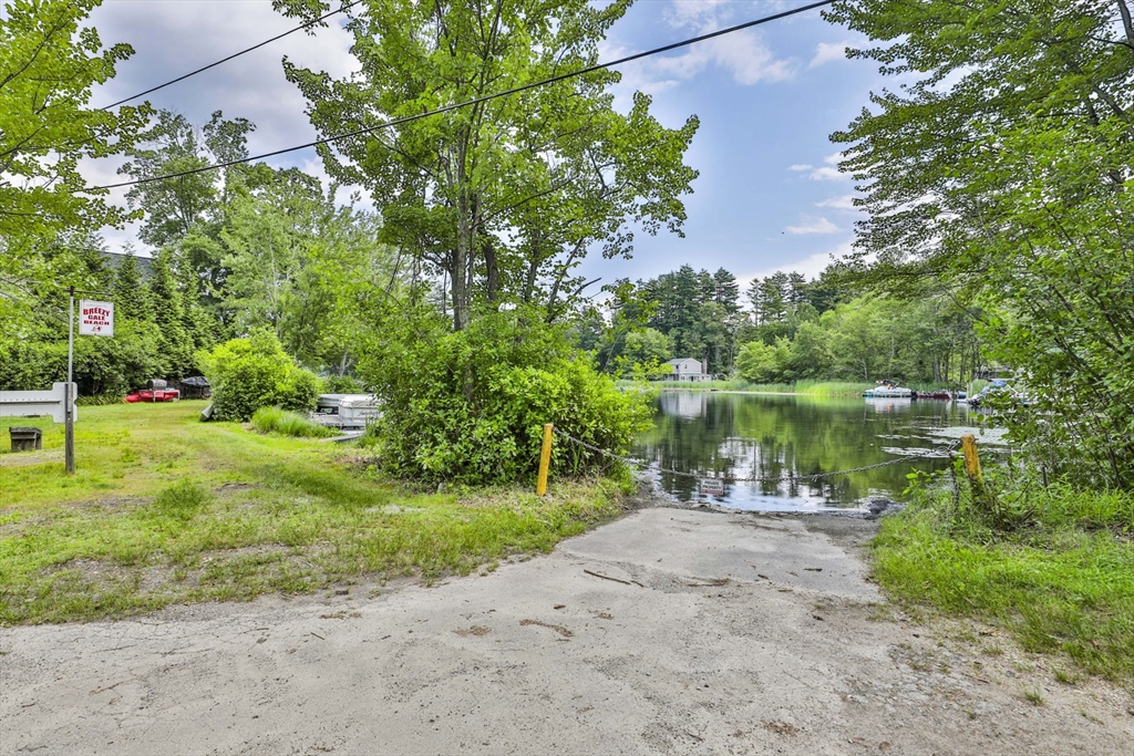 4 Cross Street Windham, NH 03087 - Photo 25 of 30 a view of a lake from a yard