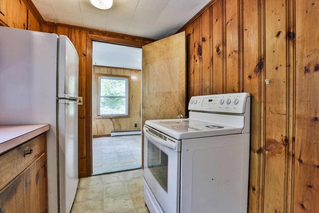 4 Cross Street Windham, NH 03087 - Photo 9 of 30 a utility room with dryer and washer