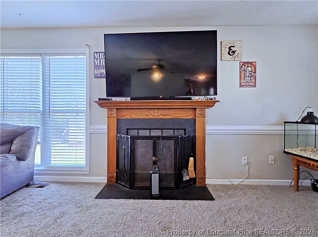 5218 Pringle Way Hope Mills, NC 28348 - Photo 7 of 43 a living room with furniture and a fireplace