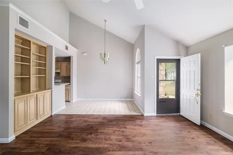 an empty room with windows