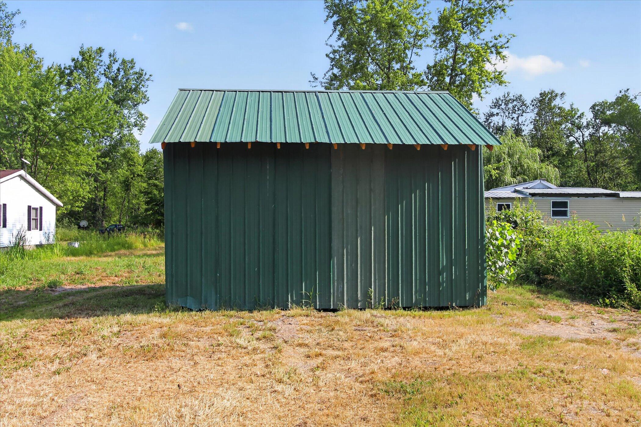 8048 17 Mile Road Rodney, MI 49342 - Photo 48 of 53 58-8048-17-Mile-Rd-Rodney-WindowStill