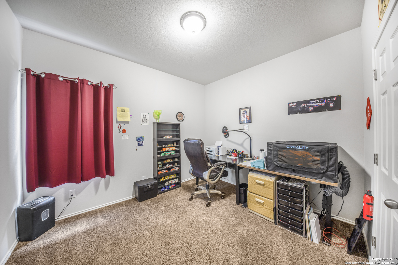 13115 Heathers Reef St. Hedwig, TX 78152 - Photo 17 of 23 a view of a room with gym equipment