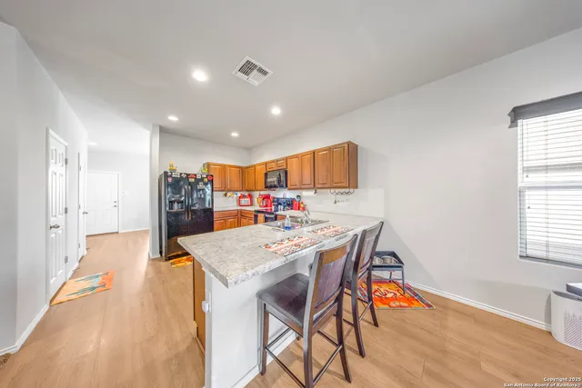 a view of a dining room with furniture