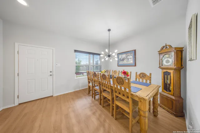a view of a dining room with furniture