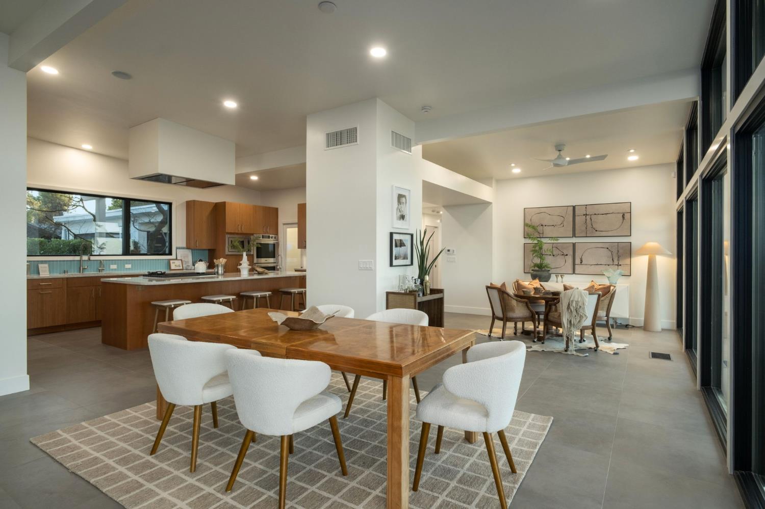 1230 West Moraga Road Fresno, CA 93711 - Photo 16 of 66 a dining room with furniture and a large window