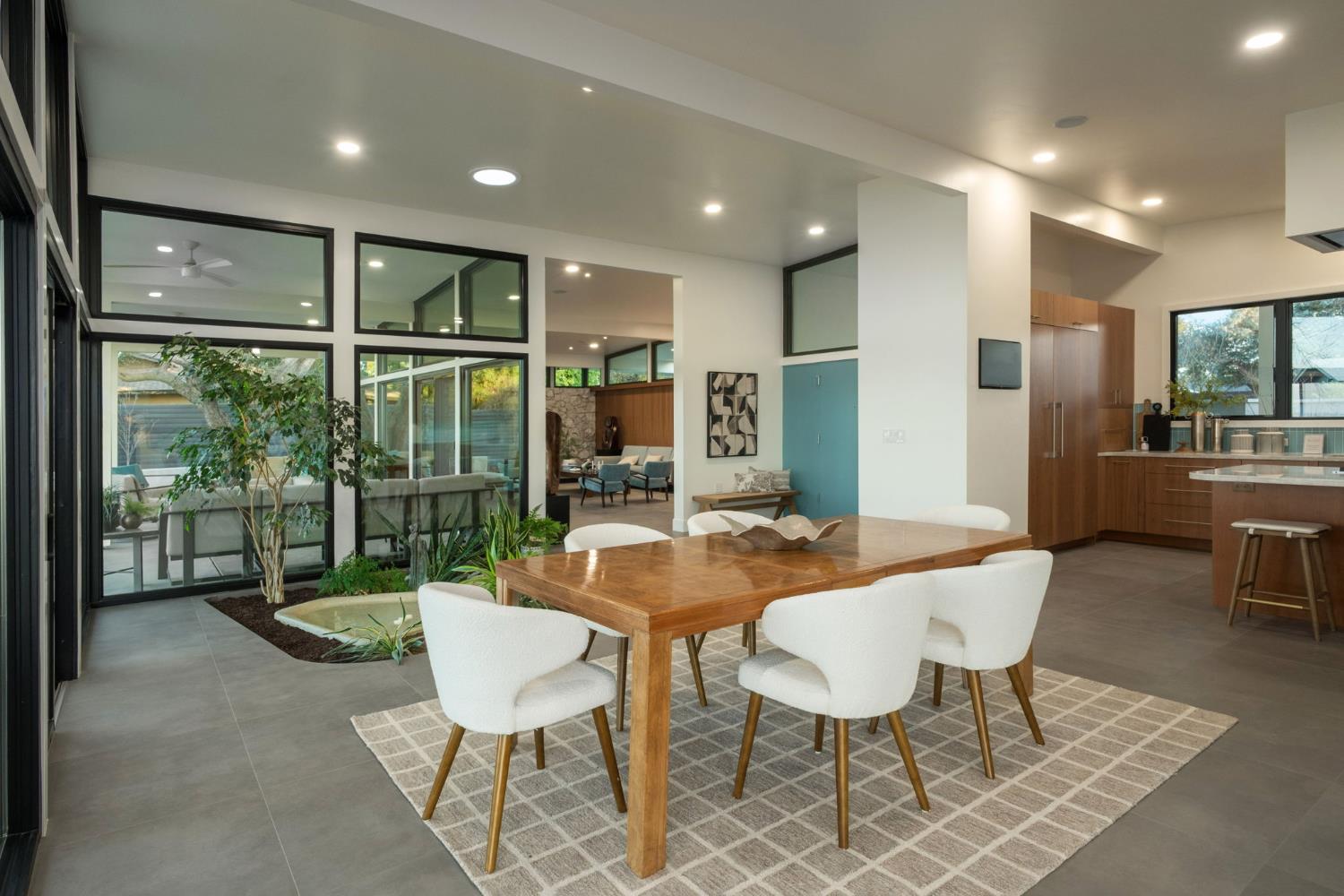 1230 West Moraga Road Fresno, CA 93711 - Photo 24 of 66 a view of a dining room with furniture window and outside view