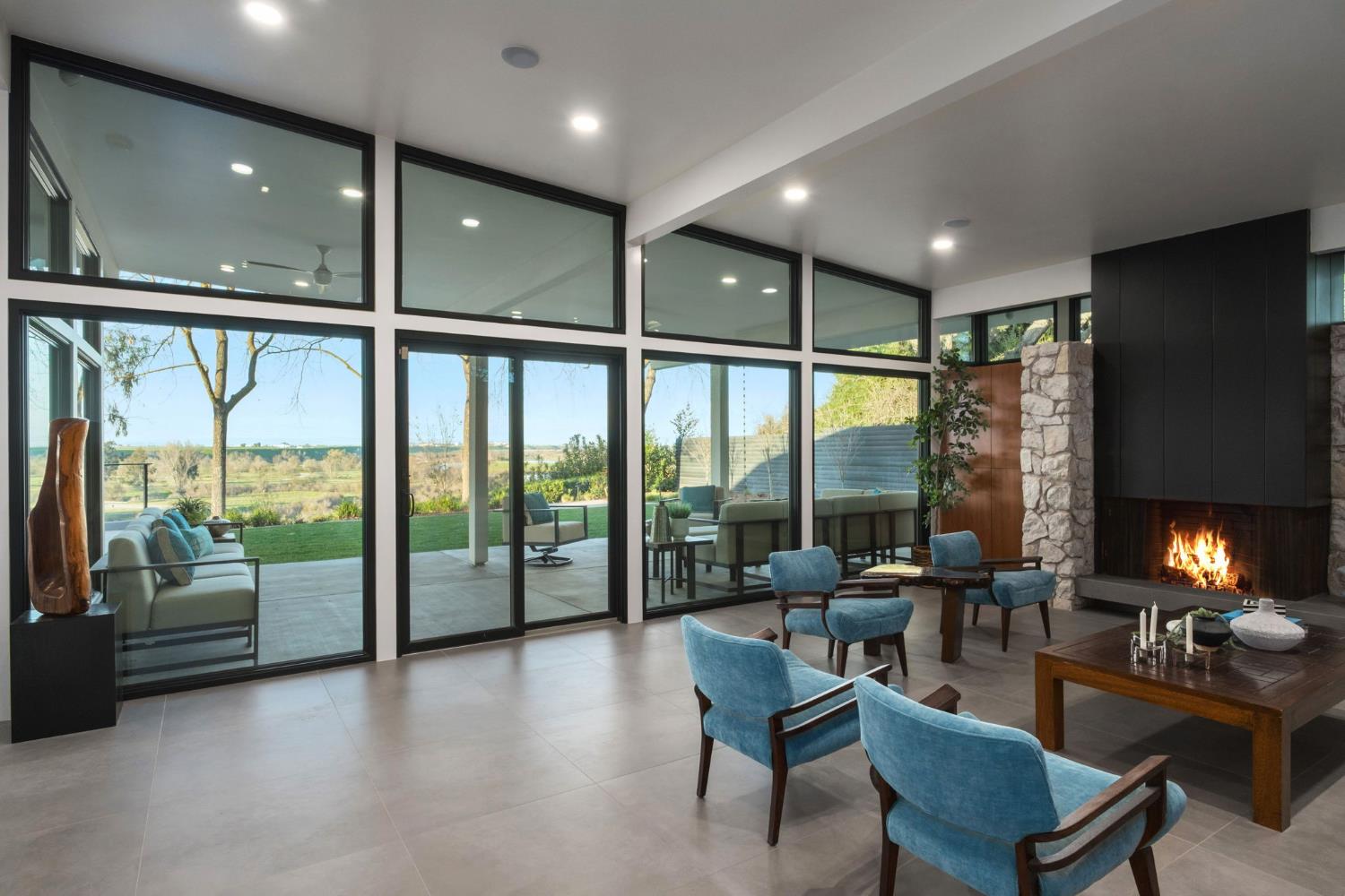 1230 West Moraga Road Fresno, CA 93711 - Photo 25 of 66 a lobby with furniture and floor to ceiling window