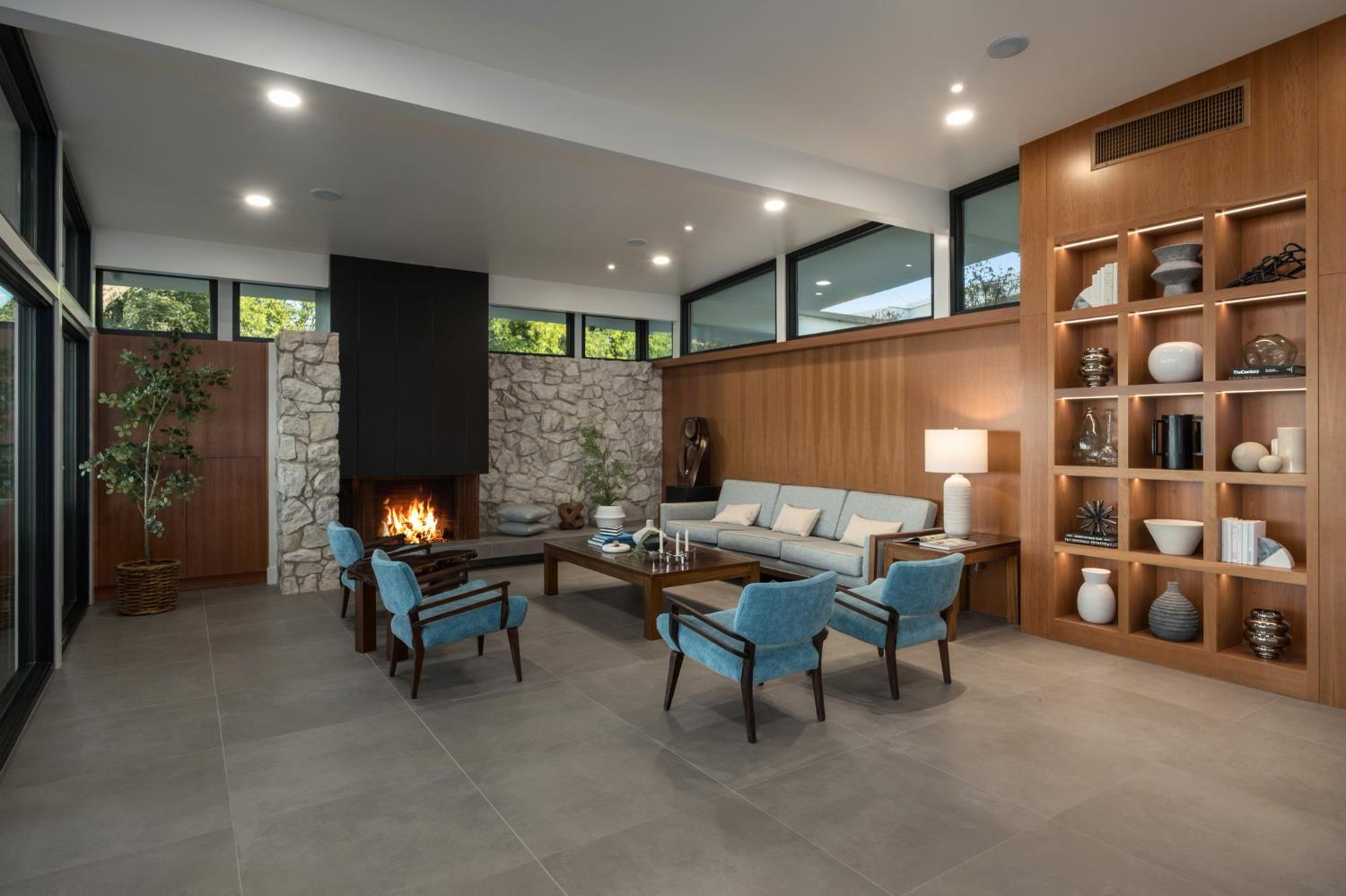 1230 West Moraga Road Fresno, CA 93711 - Photo 27 of 66 a living room with furniture a rug and a fireplace