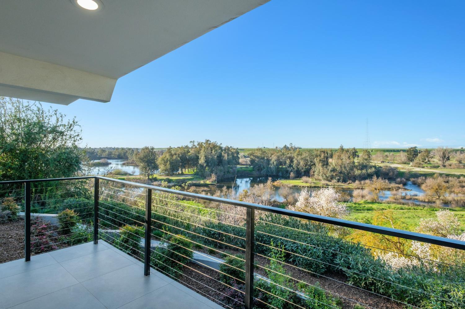 1230 West Moraga Road Fresno, CA 93711 - Photo 30 of 66 a view of city and mountain from a balcony