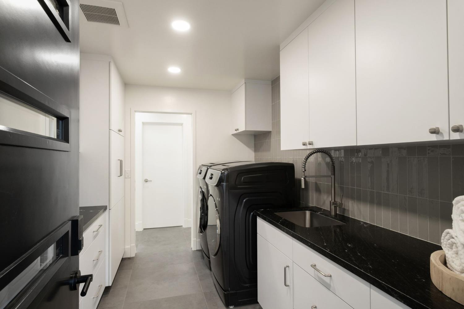 1230 West Moraga Road Fresno, CA 93711 - Photo 37 of 66 a kitchen with a sink and cabinets