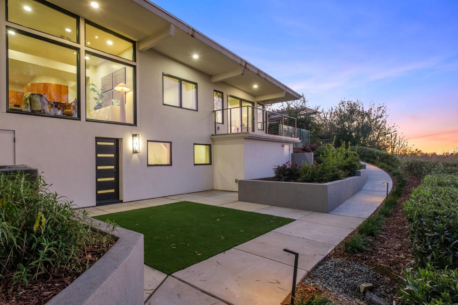 1230 West Moraga Road Fresno, CA 93711 - Photo 52 of 66 a house view with a garden space