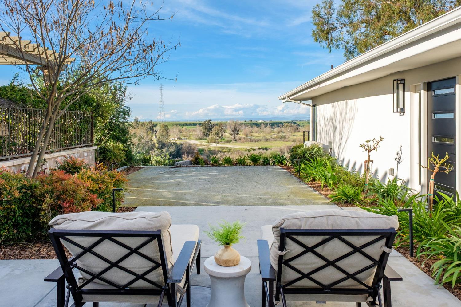 1230 West Moraga Road Fresno, CA 93711 - Photo 64 of 66 a view of a chairs and table in patio