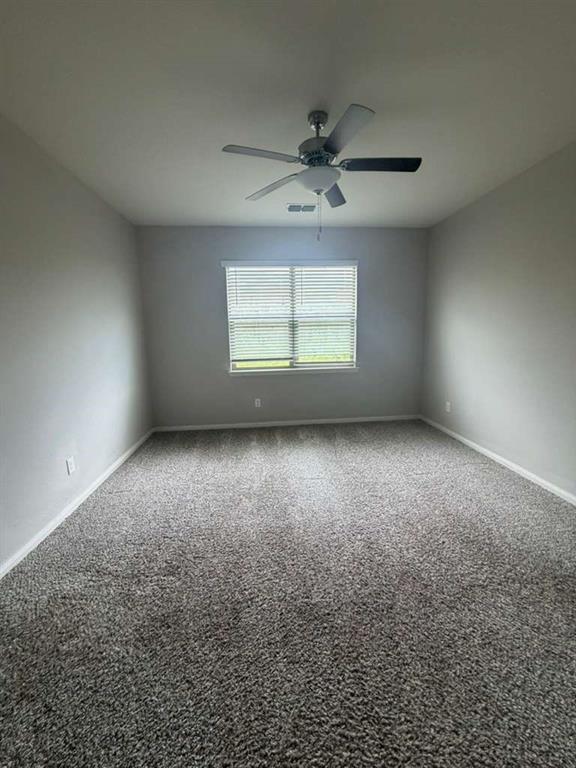 310 Foster Lane Anna, TX 75409 - Photo 2 of 15 Spacious room featuring neutral tone carpeting and a single window with blinds