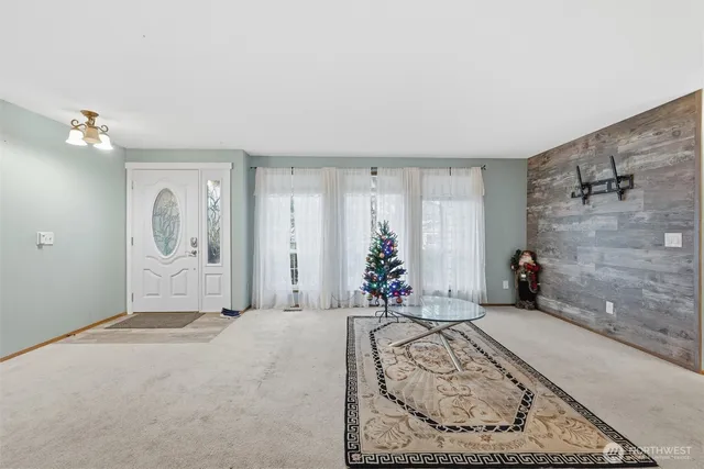 a bedroom with a bed and a potted plant