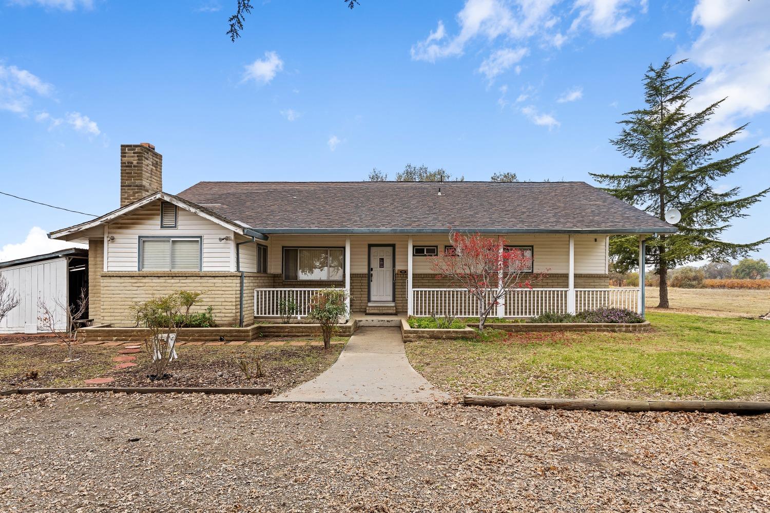 15355 Free Road Lodi, CA 95242 - Photo 1 of 1 a front view of a house with a yard