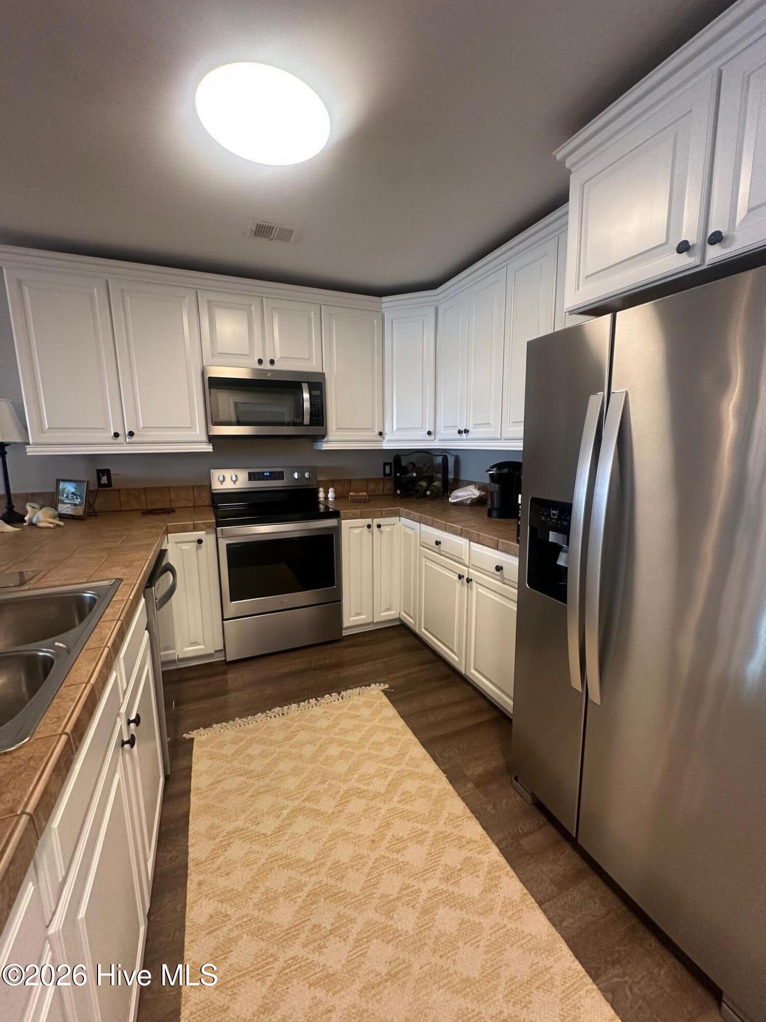 1912 Goose Creek Road Southwest, Unit 4103 Ocean Isle Beach, NC 28469 - Photo 12 of 53 Kitchen with new appliances