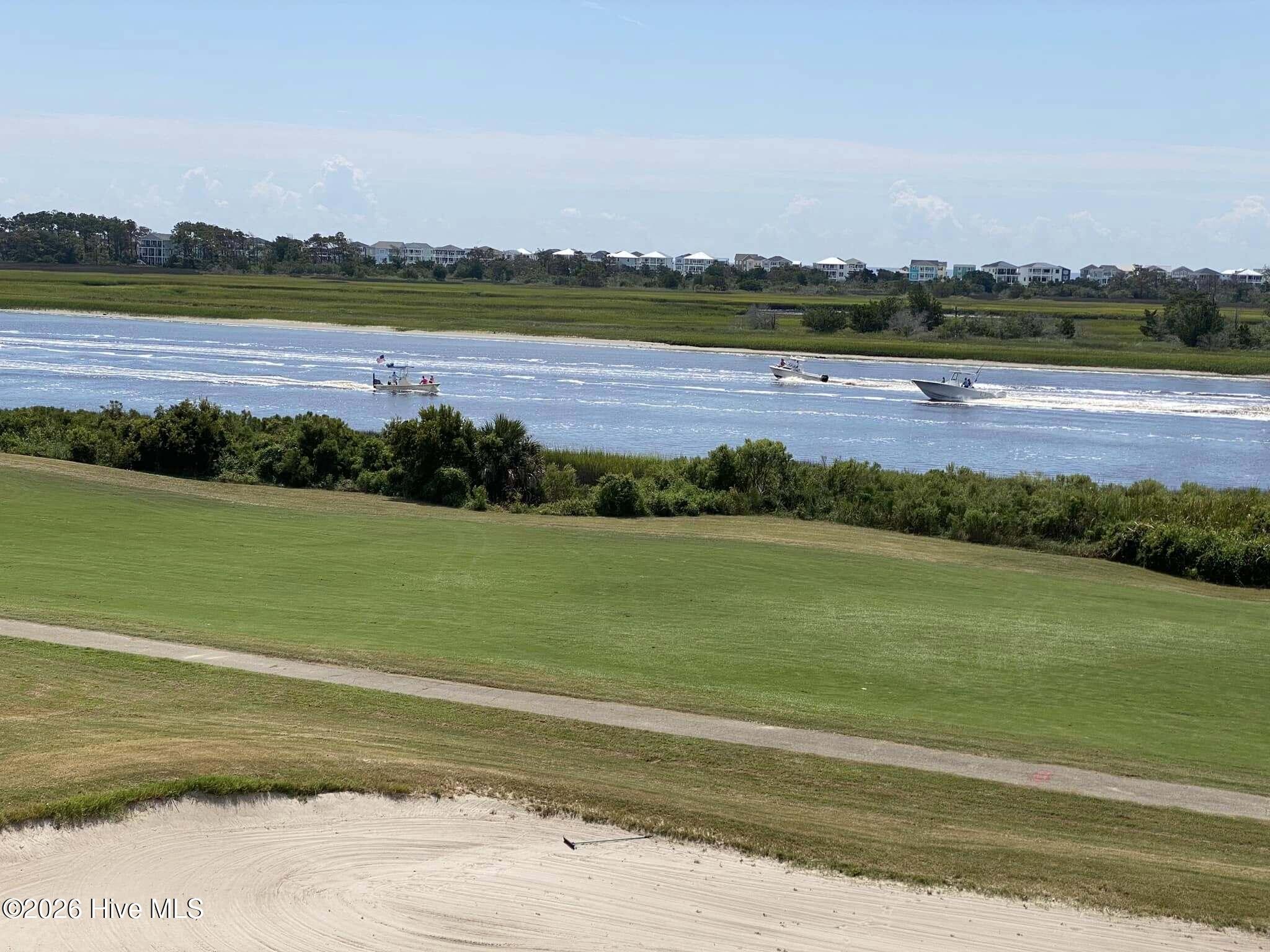1912 Goose Creek Road Southwest, Unit 4103 Ocean Isle Beach, NC 28469 - Photo 38 of 53 watch the boats going by