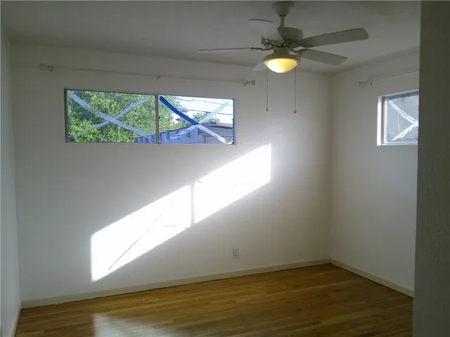 a view of an empty room and window