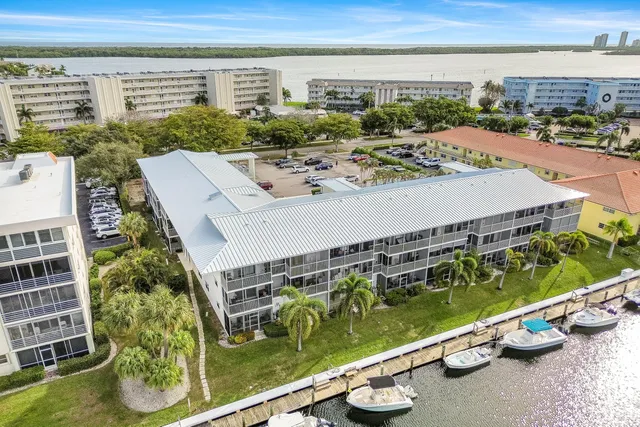 a view of a balcony with an outdoor seating