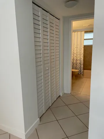 a view of livingroom with closet