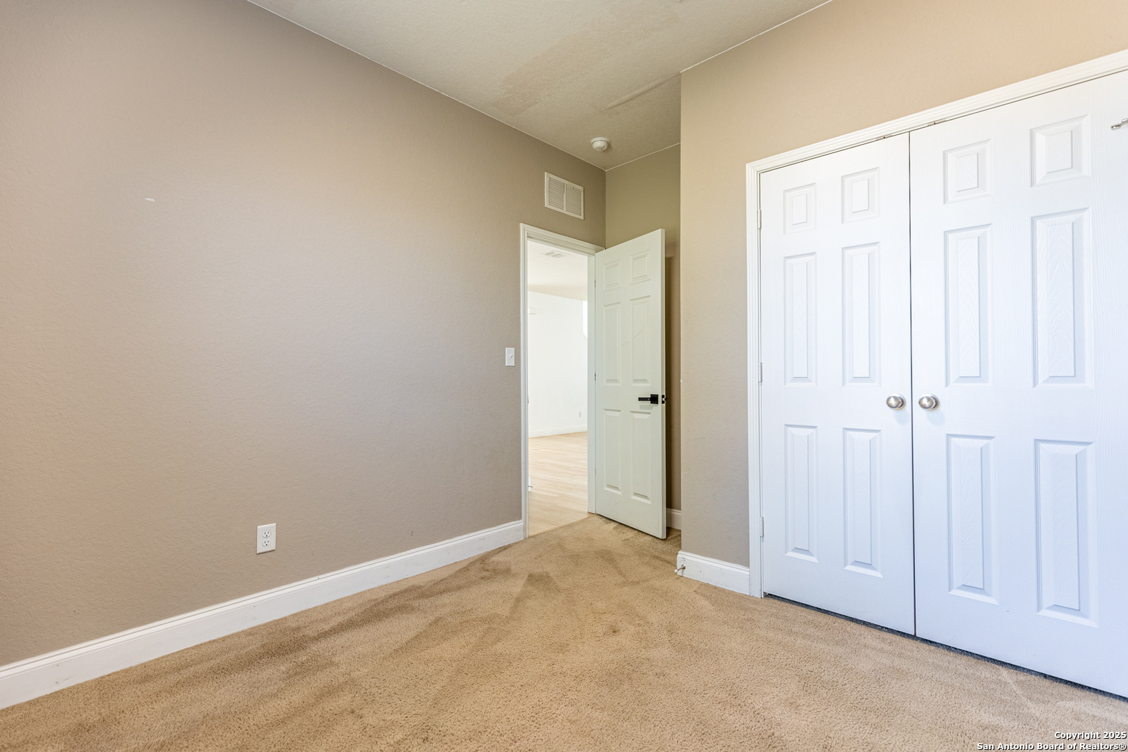 443 Harvest Point Selma, TX 78154 - Photo 12 of 33 an empty room with windows