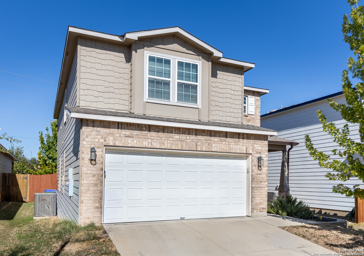 443 Harvest Point Selma, TX 78154 - Photo 2 of 33 a front view of a house