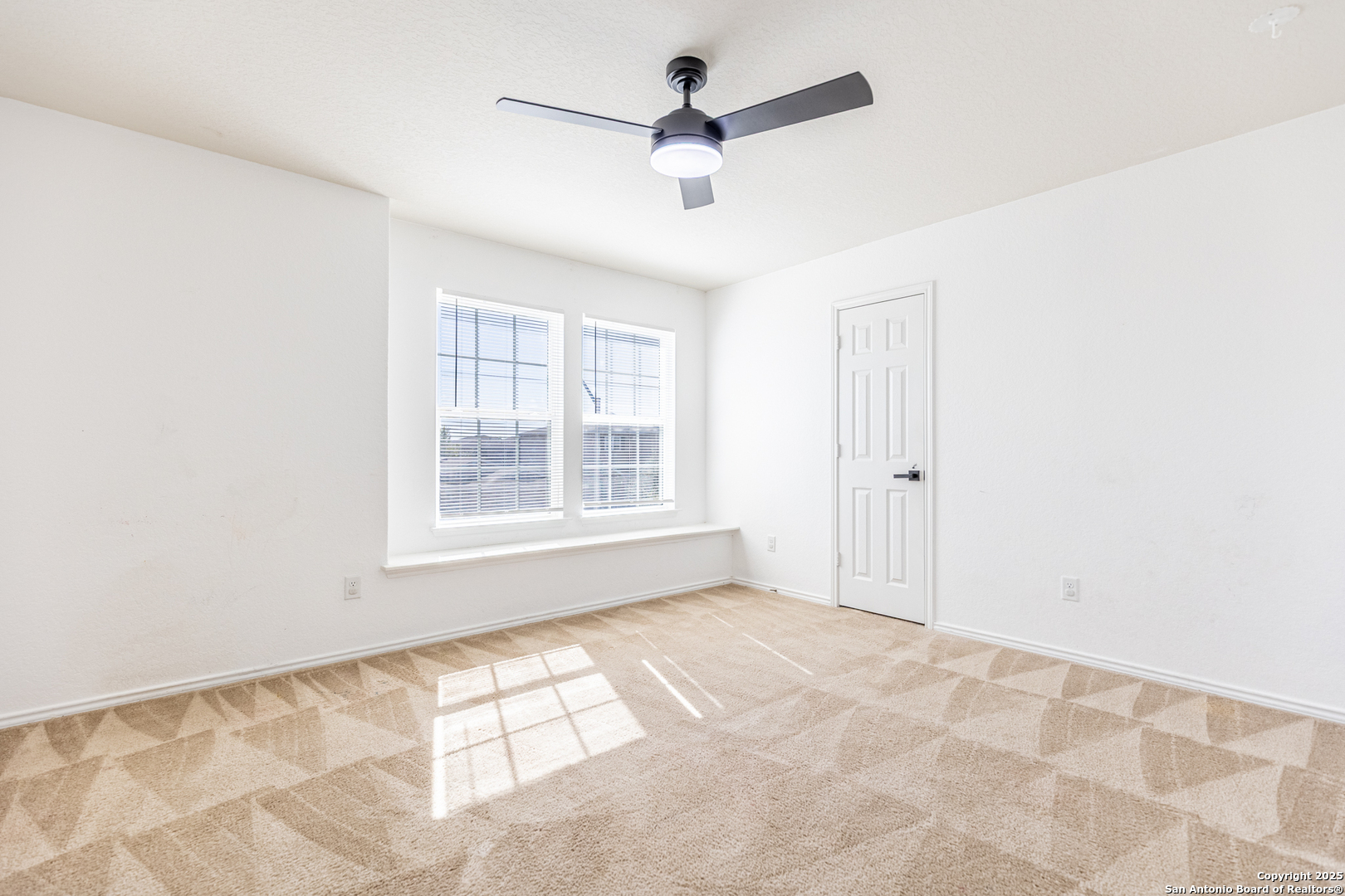 443 Harvest Point Selma, TX 78154 - Photo 24 of 33 a view of an empty room with a window