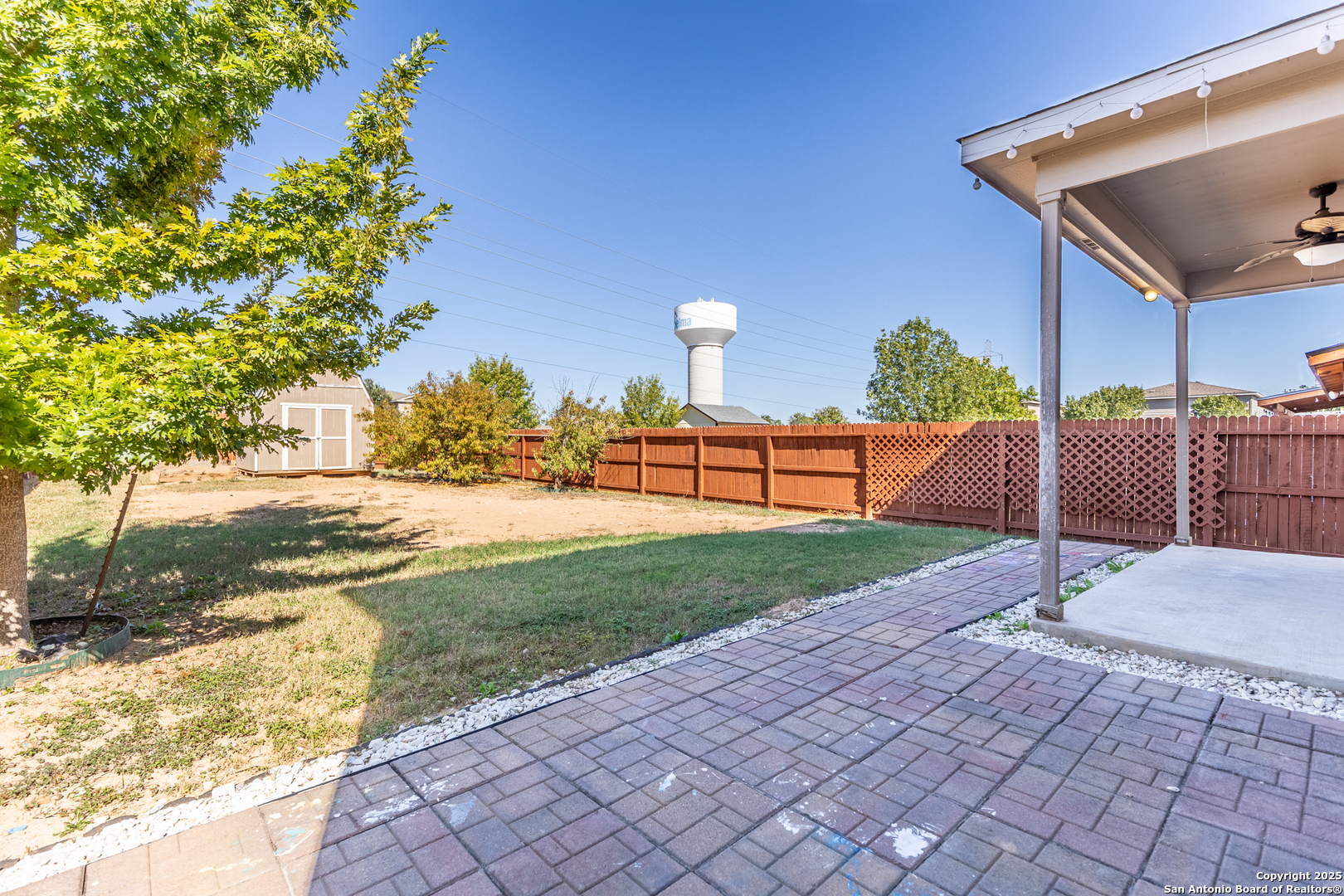 443 Harvest Point Selma, TX 78154 - Photo 30 of 33 a view of a backyard with sitting area