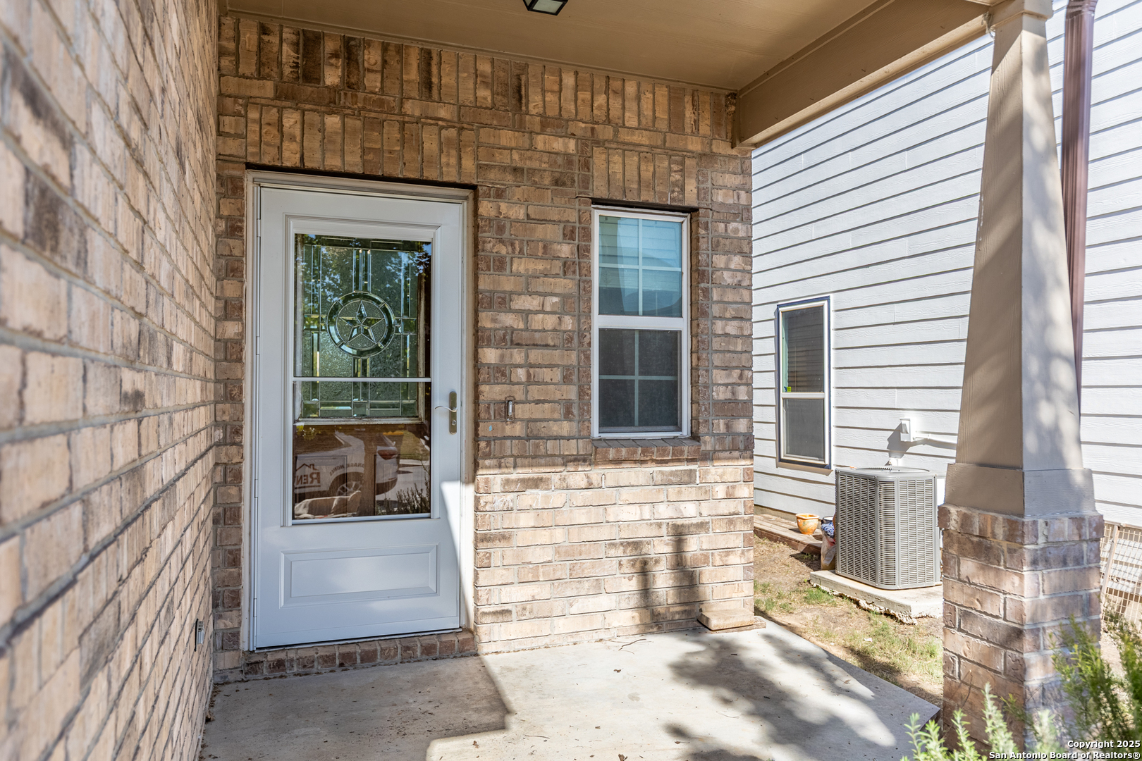 443 Harvest Point Selma, TX 78154 - Photo 3 of 33 a view of entrance door of the house