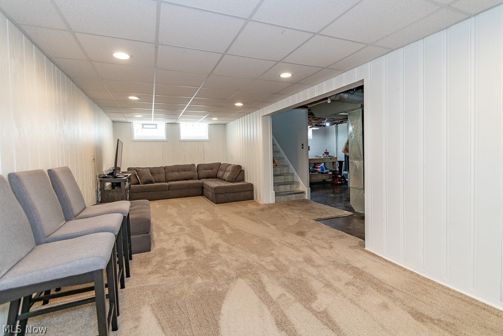 1314 Mayfield Ridge Road Cleveland, OH 44124 - Photo 30 of 40 Living room featuring a drop ceiling and light colored carpet