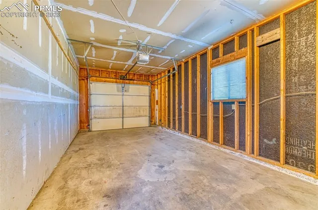 a view of porch with wooden floor and door