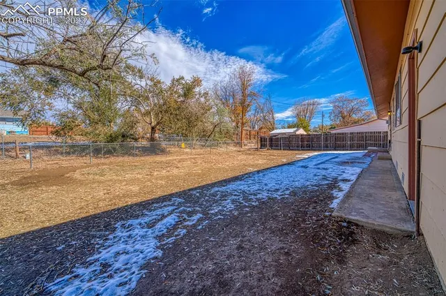 a view of a yard with an outdoor space