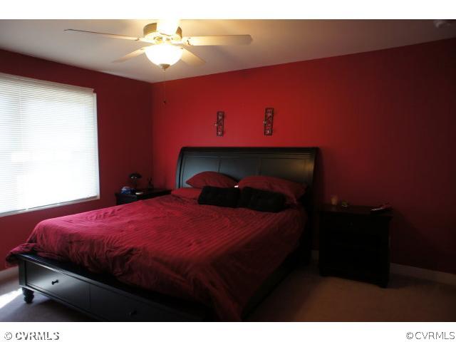 11605 Hillside Road Chester, VA 23831 - Photo 12 of 24 a bedroom with a bed and a closet