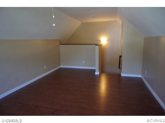 11605 Hillside Road Chester, VA 23831 - Photo 18 of 24 a view of an empty room with wooden floor