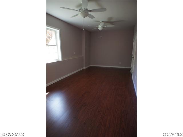 11605 Hillside Road Chester, VA 23831 - Photo 20 of 24 a view of an empty room with wooden floor