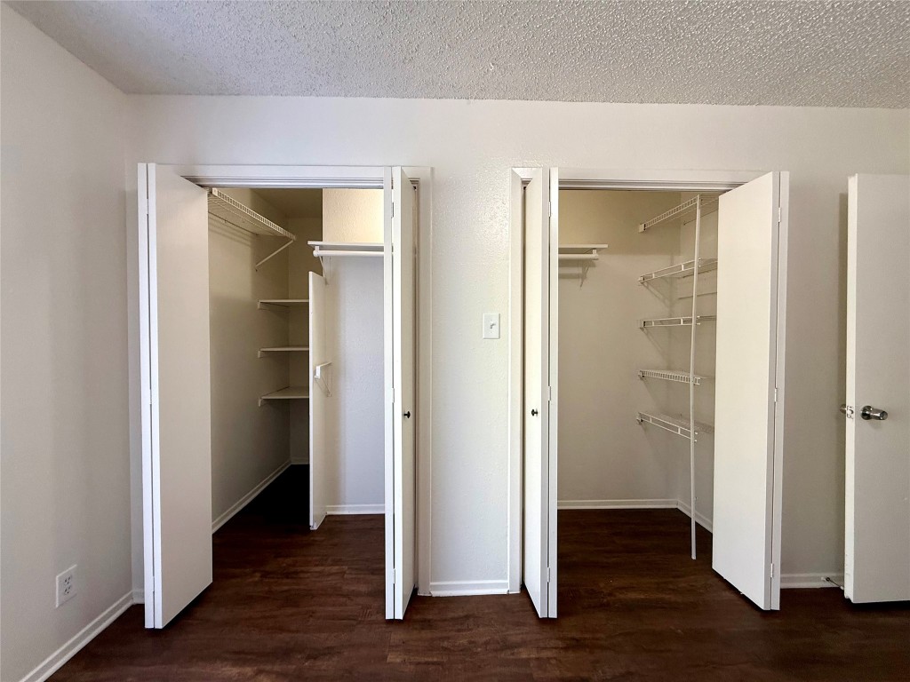 1509 Cinnamon Path, Unit B Austin, TX 78704 - Photo 13 of 19 an empty room with wooden floor & closet