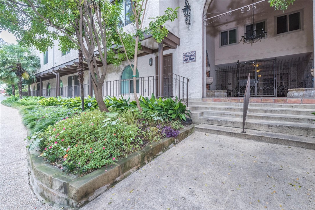 505 West 7th Street, Unit 103 Austin, TX 78701 - Photo 15 of 21 front view of a house with a yard