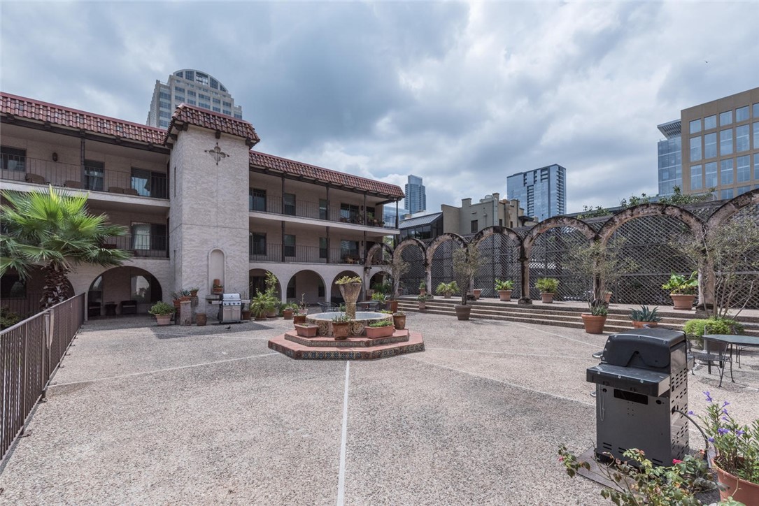 505 West 7th Street, Unit 103 Austin, TX 78701 - Photo 16 of 21 a outdoor space with the couches and a potted plant