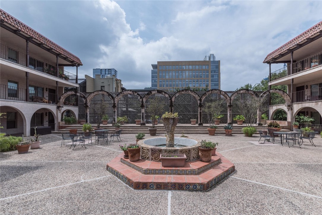 505 West 7th Street, Unit 103 Austin, TX 78701 - Photo 21 of 21 a building exterior with stairs and windows
