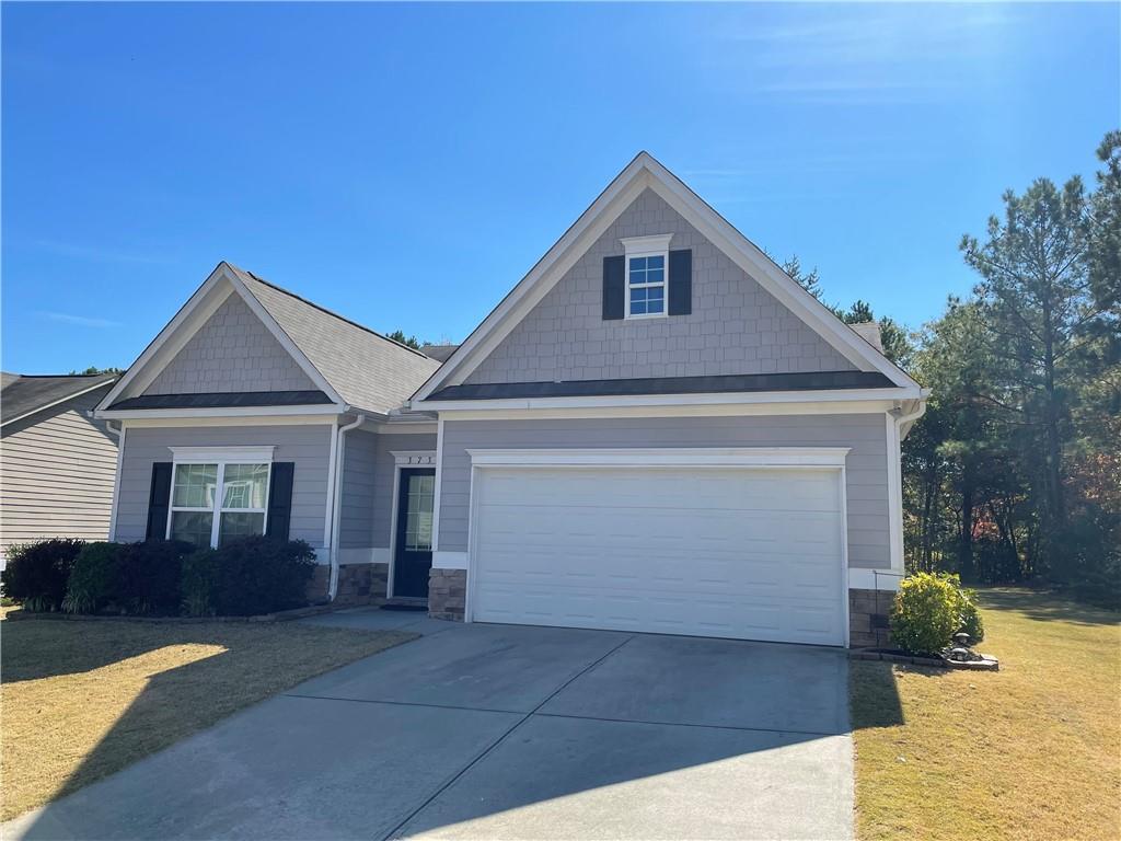3736 Ridge Bluff Overlook Gainesville, GA 30507 - Photo 1 of 1 a front view of a house with yard