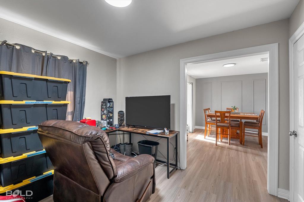 2517 Conrad Street Bossier City, LA 71111 - Photo 12 of 39 a work room with furniture and a flat screen tv