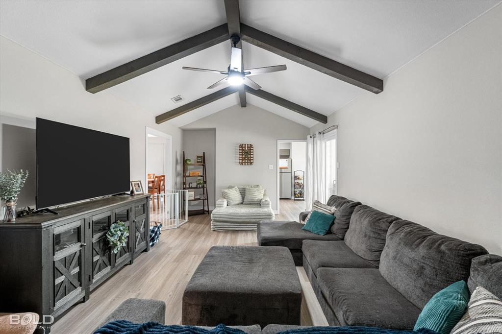 2517 Conrad Street Bossier City, LA 71111 - Photo 17 of 39 a living room with furniture and a flat screen tv