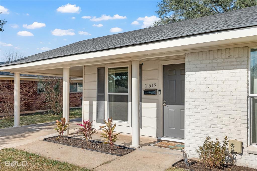 2517 Conrad Street Bossier City, LA 71111 - Photo 2 of 39 a backyard of a house with seating space